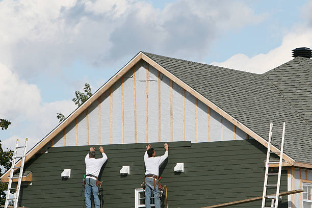 Professional Siding Repair technician working in Rock Creek, MN
